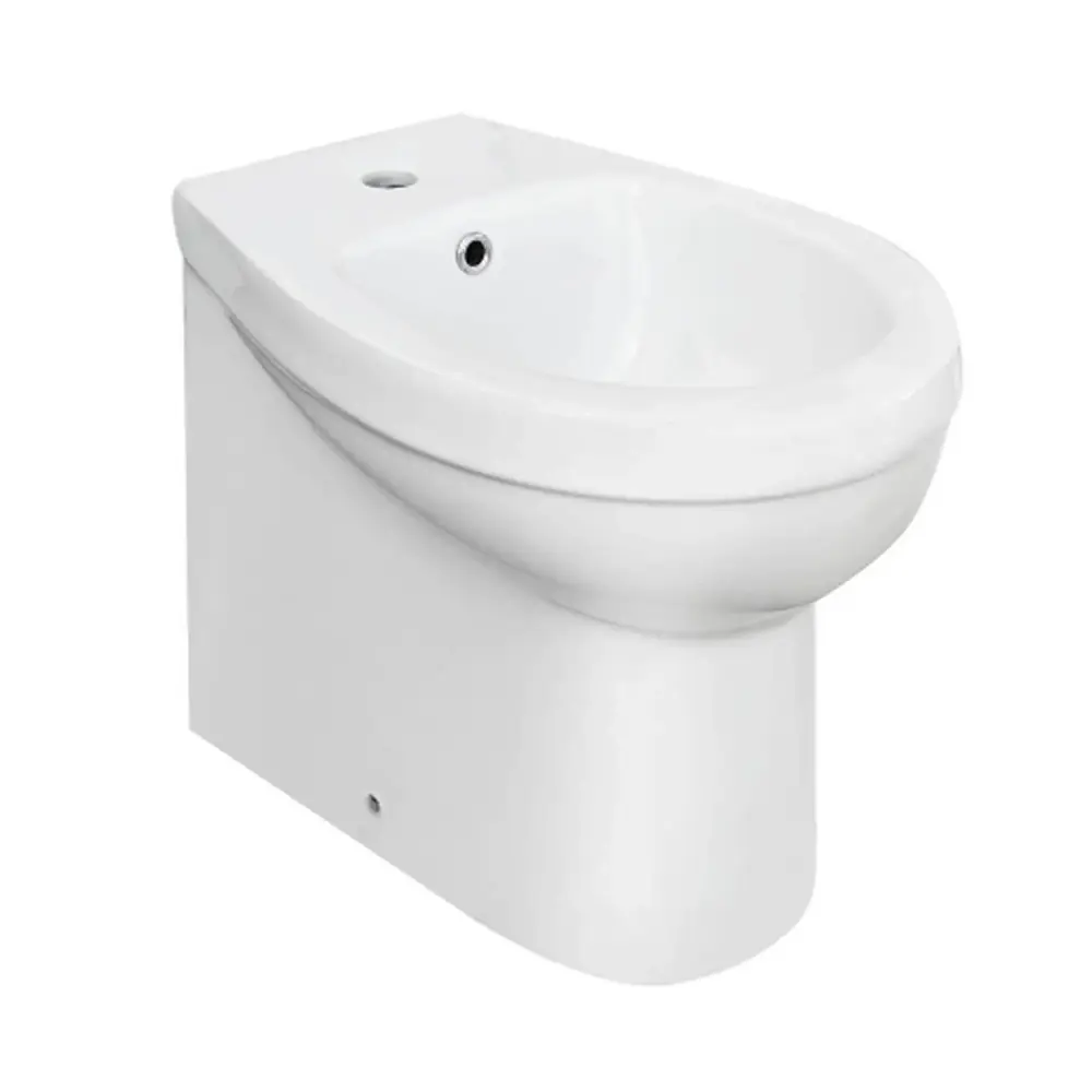 Bidé empotrado serie King en cerámica blanca con rebosadero y orificio para griferí