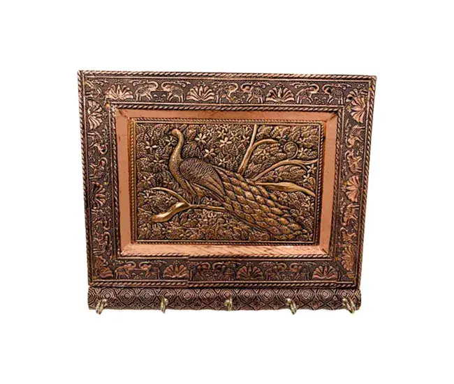 Llavero de metálico repujado color cobre 22,5x17,5x2