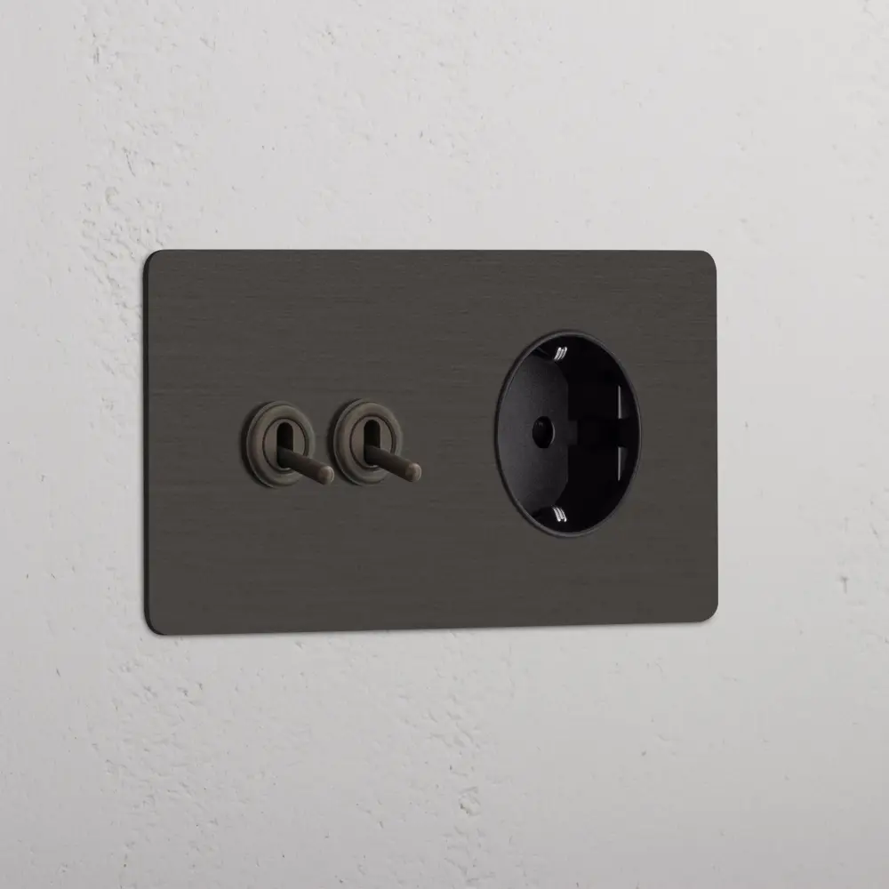 Interruptor Simple Kew Enchufe con palanca x2 y Schuko tipo F (marco doble) - Bronce | Negro