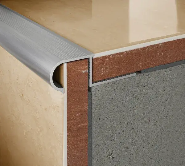 Perfil escalón curvo aluminio 11 mm Brenner Brenner_logo